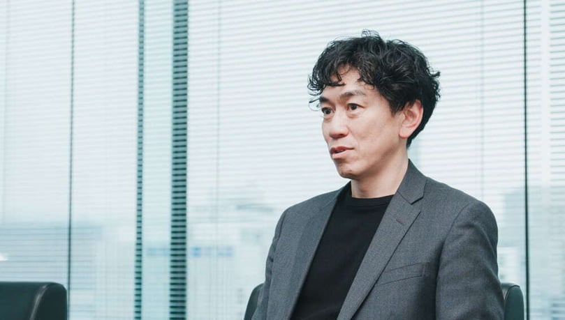 デジタル・マーケティング部 副部長　西本 和幸 様（写真）