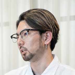 オペレーション統括部 部長 星野 友彰様の写真